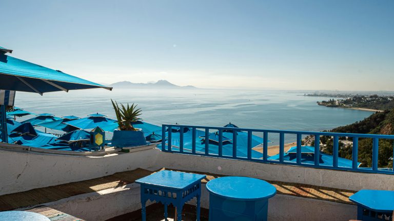Enjoy a breathtaking view of the Mediterranean Sea from a vibrant café in Carthage, Tunisia.Хани Травел - летни аранжмани -Тунис